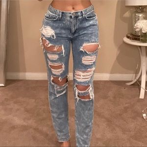 Super distressed acid wash boyfriend jeans